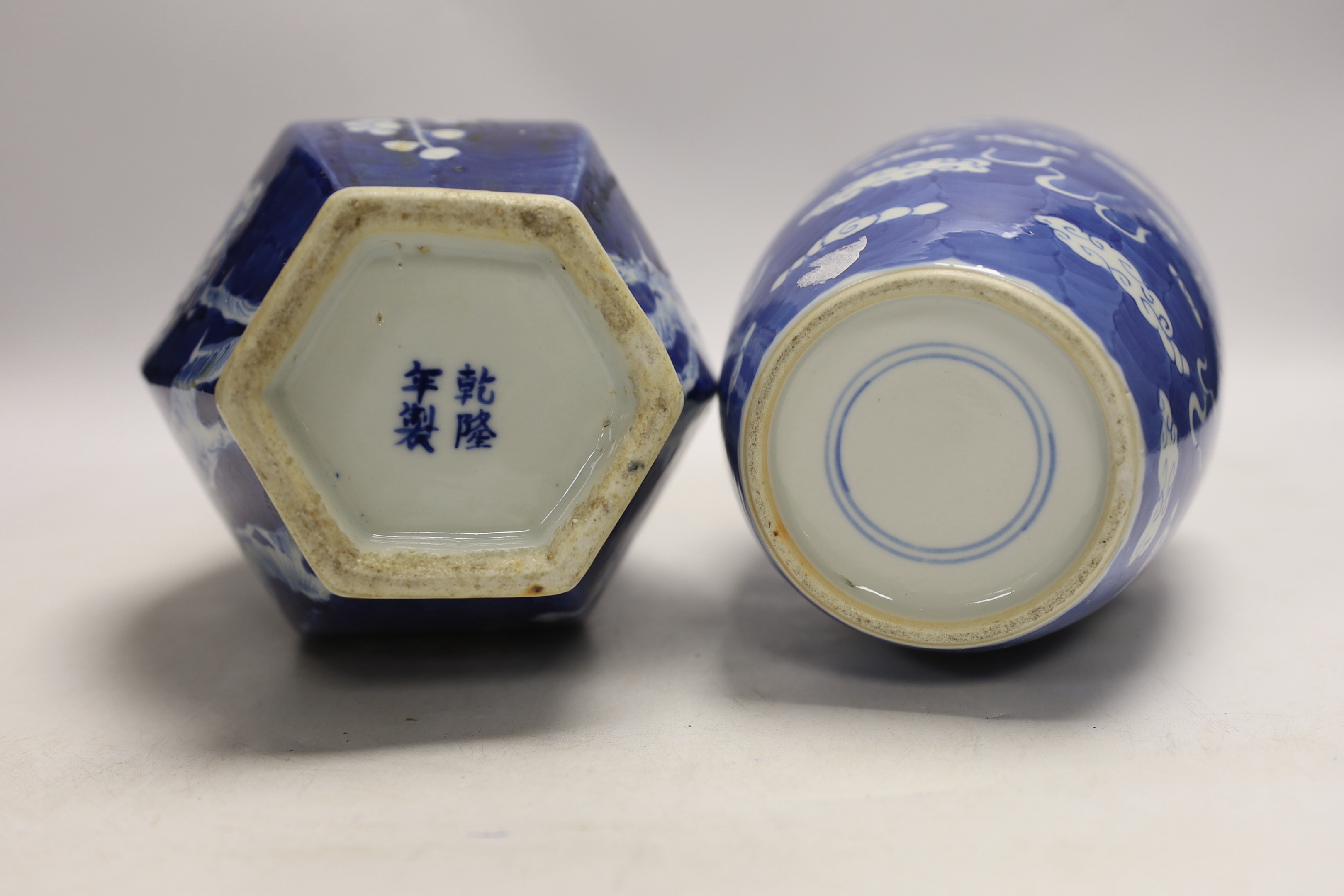 A Chinese blue and white hexagonal baluster vase, Qianlong mark, 19th century and a blue and white ‘dragon’ jar and cover, 19th century, tallest 36cm (2)